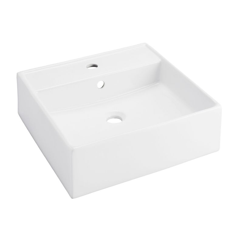 Une vasque à poser, en porcelaine blanche sur une forme carrée actuelle qui apporte une touche moderne et intemporelle à votre salle de bains. Choisissez la robinetterie de votre choix sur ce site. - Vasque en porcelaine à poser.- Dimensions : L.46.5 x l.46.5 x H.14 cm- Avec trop plein